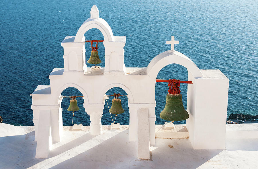 Traditional white christian church belfry with bells. Santorini island in Greece Photograph by Michalakis Ppalis