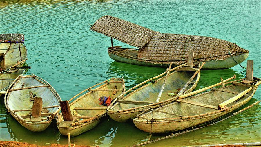 Traditional wooden boats in North Vietnam Photograph by Robert Bociaga