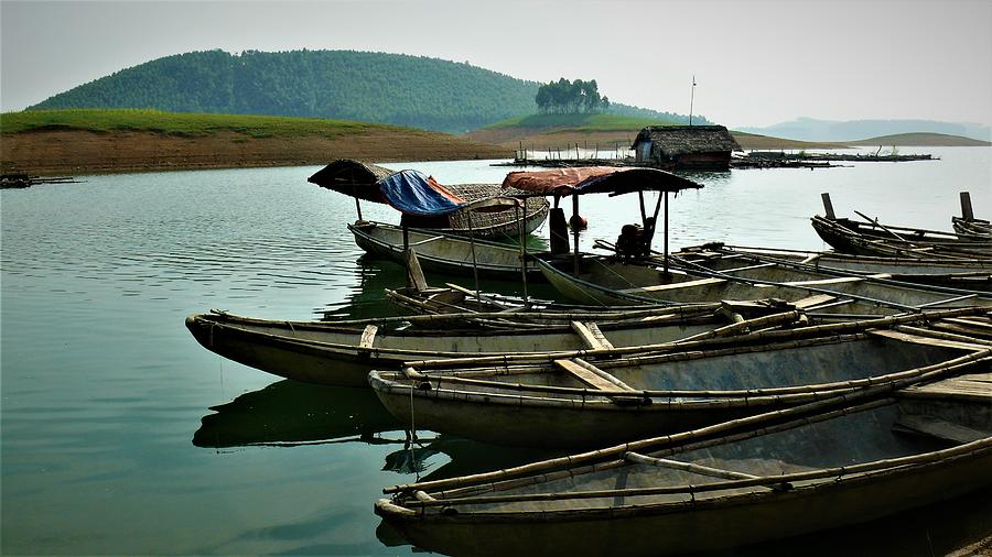 Traditional wooden boats in Vietnam Photograph by Robert Bociaga