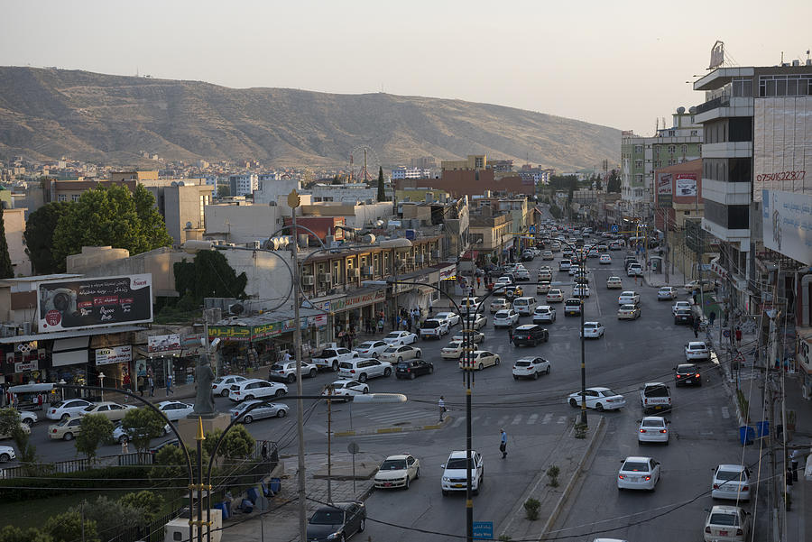 Traffic and landscape in Dohuk, Iraq Photograph by Joel Carillet