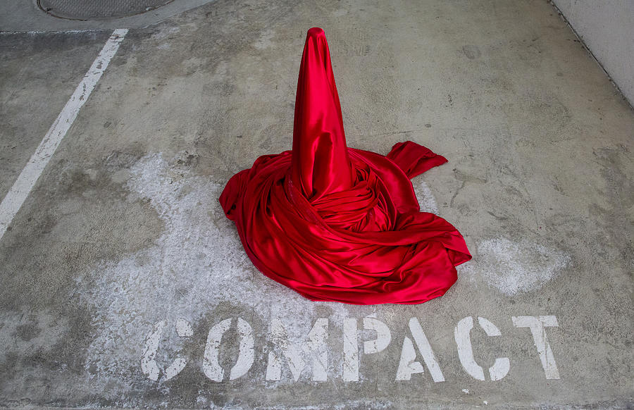 Traffic Cone Covered in Red Fabric in Compact Parking Spot Photograph by Mimi Haddon