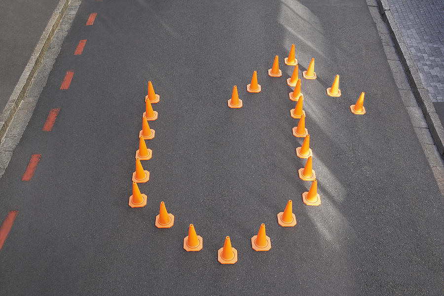 Traffic cones in u-turn formation Photograph by Martin Barraud