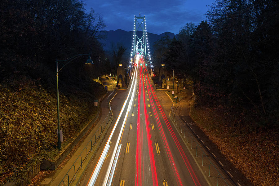 Traffic over the Lions Gate Bridge Photograph by Michael Russell