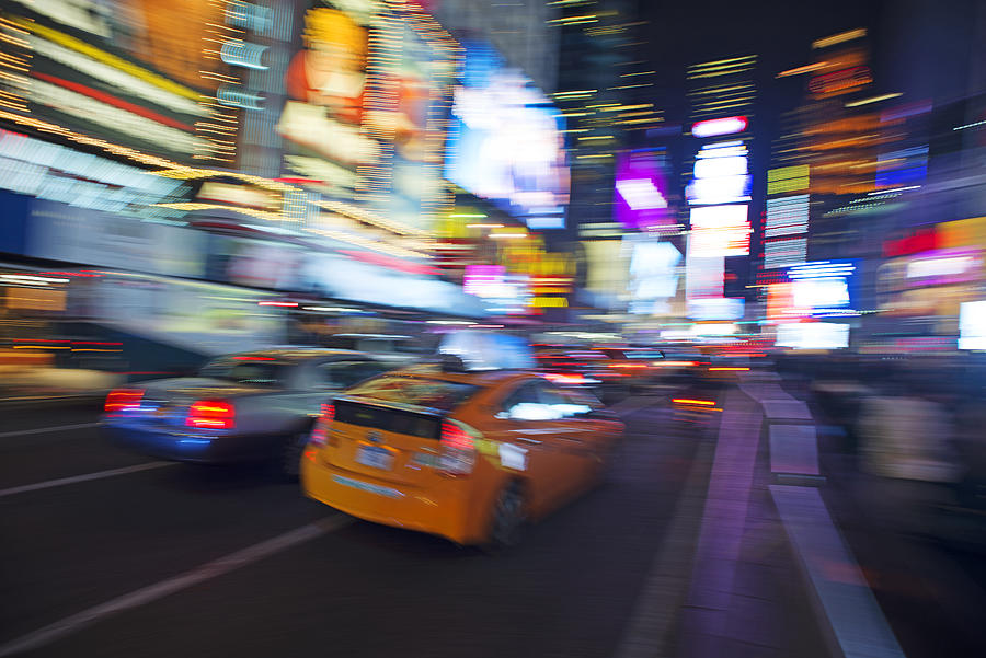 Traffic pan-blur in Times Square, NYC. Photograph by Rudi Von Briel
