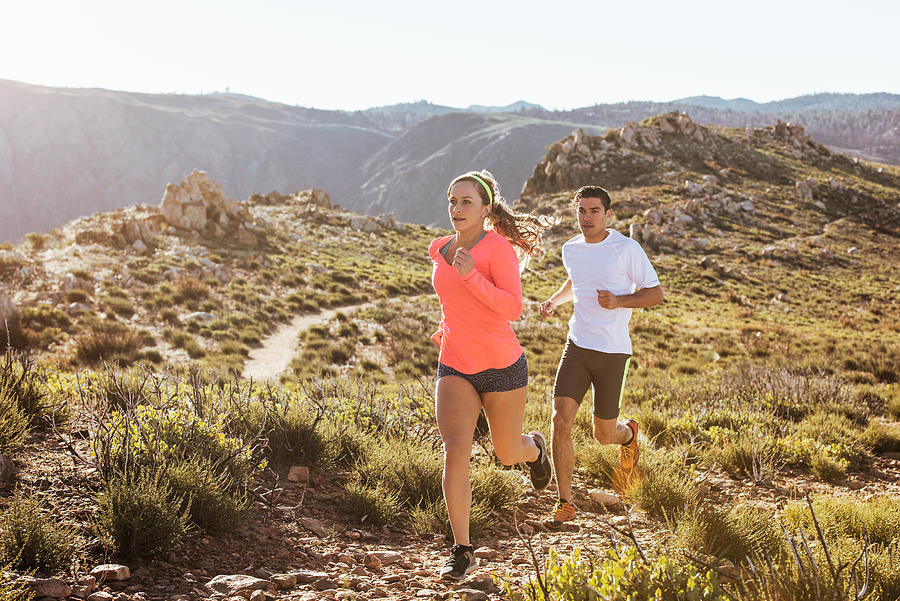 Trail running couple on Pacific Crest Trail, Pine Valley, California, USA Photograph by Corey Jenkins