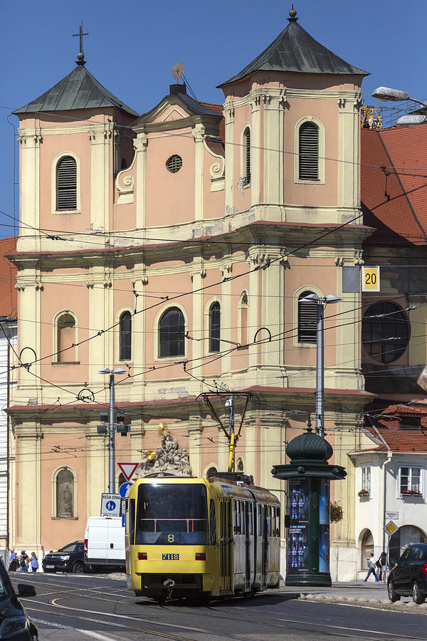 Tram in a busy street in Bratislava - Slovakia Photograph by SteveAllenPhoto