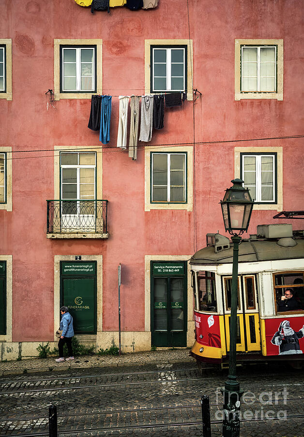 Tram in Front of Pink House on Laundry Day Photograph by M G ...