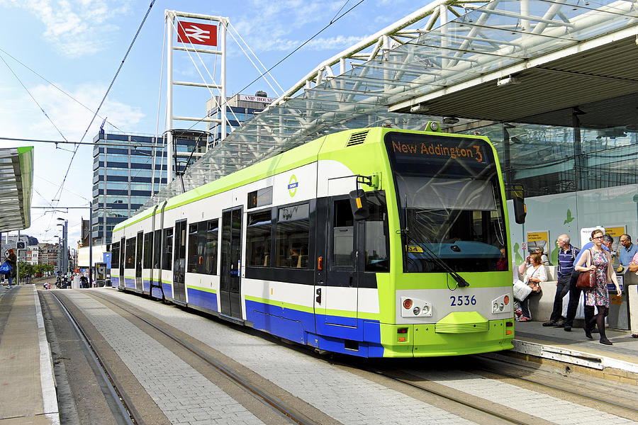 Tramlink tram stops outside East Croydon Railway Station Photograph by BeyondImages