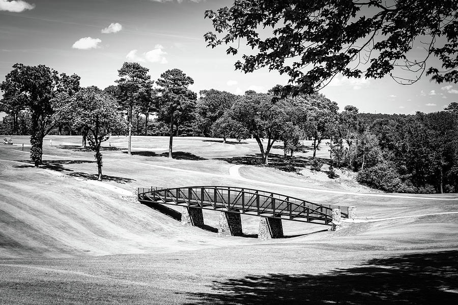 Tranquil Crossing - A Serene Bridge On Little Rocks Golf Oasis - Black And White Photograph by Gregory Ballos