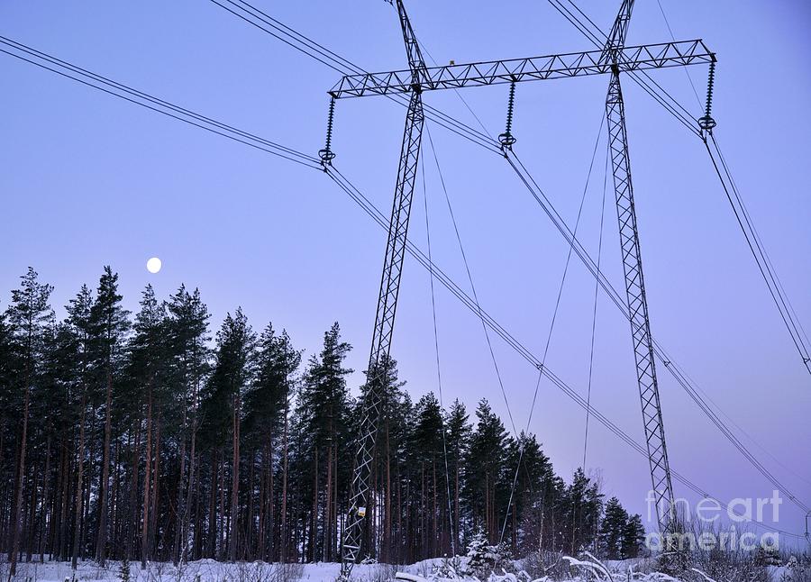 Winter Photograph - Transmission of electricity 3 by Esko Lindell