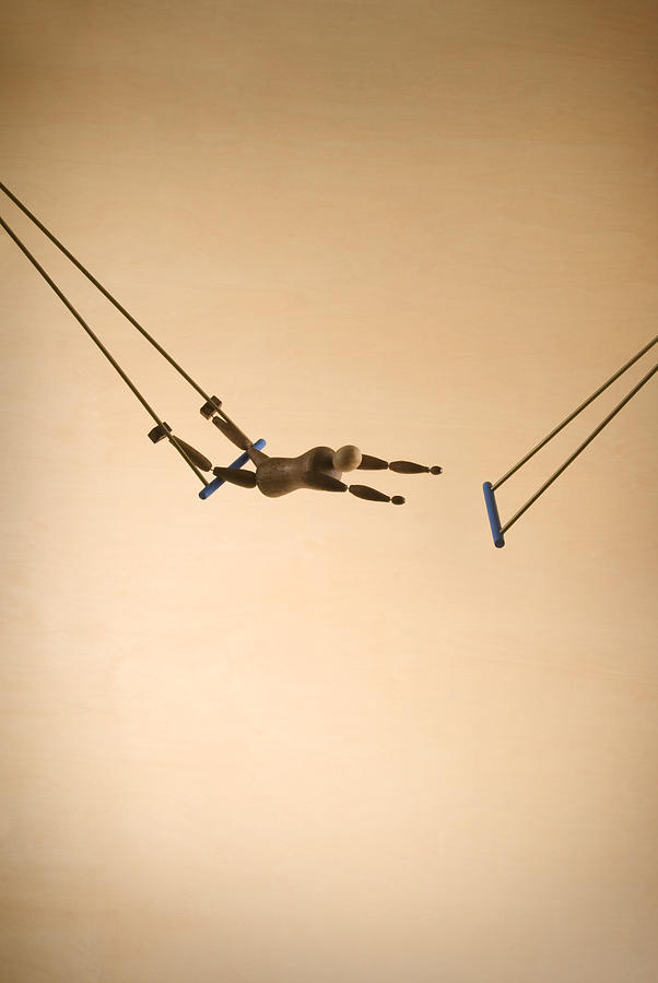 Trapeze Acrobat Photograph by WoodenheadWorld
