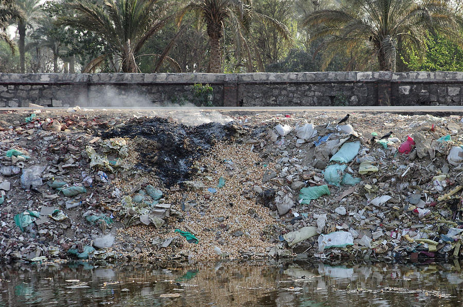 Trash pile on fire in Cairo Photograph by Sherri Damlo, Damlo Shots, Damlo Does, LLC