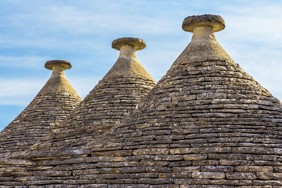 Tre Amici - Trulli Roof Tops in Alberobello, Italy Photograph by Elvira Peretsman