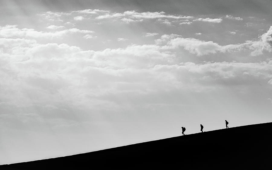 Great Sand Dunes National Park Photograph - Trekking home by Stephen Holst