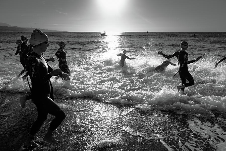 Triathlon swimmers Photograph by Gary Browne
