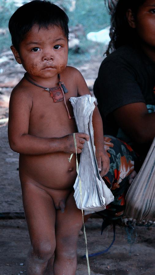 Tribal boy with a book Photograph by Robert Bociaga