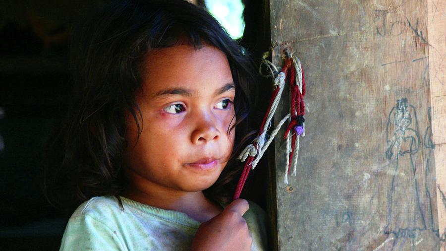 Tribal girl at the front door Photograph by Robert Bociaga
