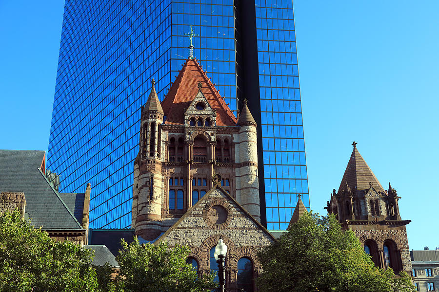 Trinity Church in front of the shiny metallic facade of 200 Clarendon, the former John Hancock Tower Photograph by Rainer Grosskopf