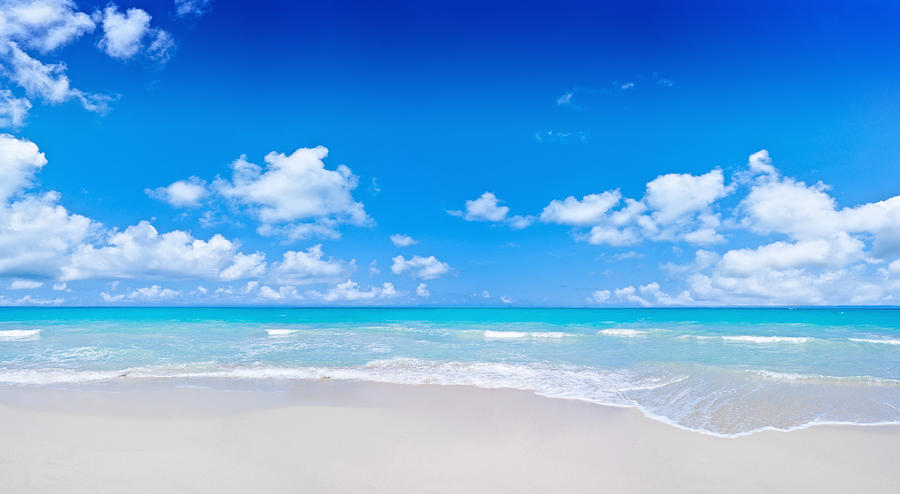 Tropical Beach and cloudy deep blue sky Photograph by Apomares