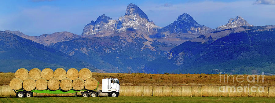 Truck Hauling Hay with Teton Mountains in Background Photograph by Lane Erickson