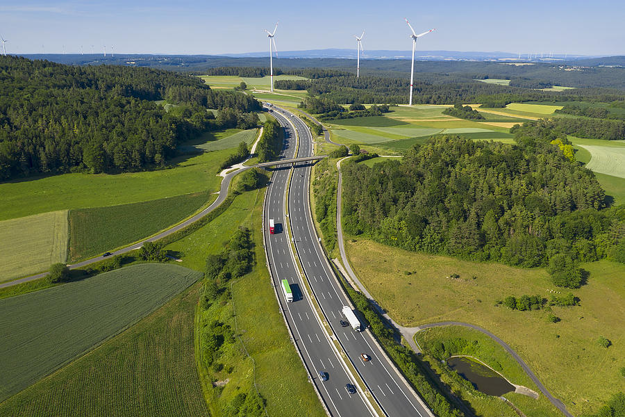Trucks on Highway and Wind Turbines, Aerial View Photograph by Bim