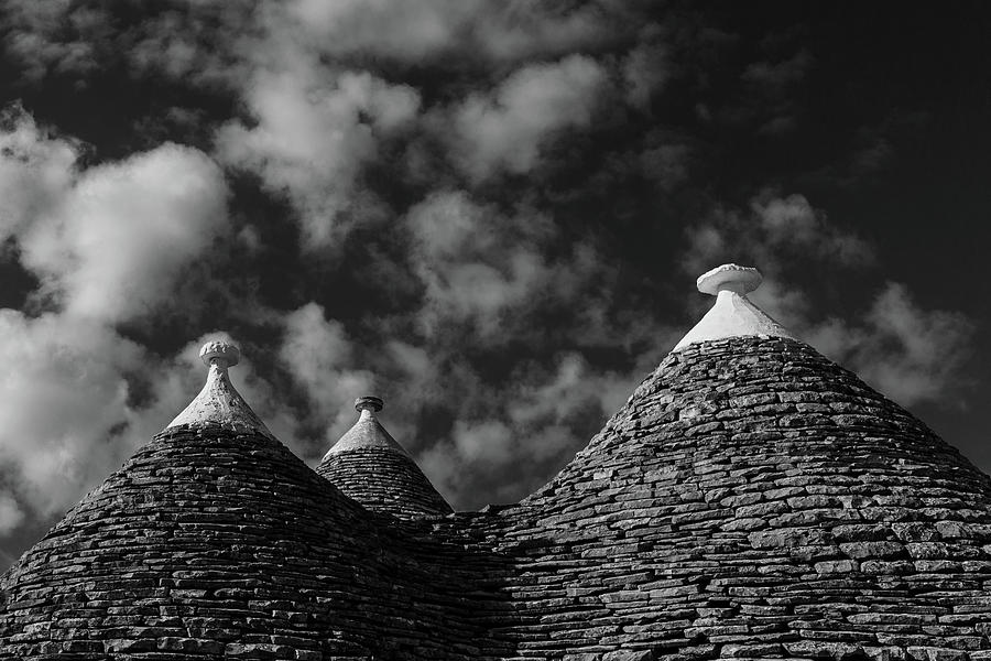Trulli roofs bnw Photograph by Umberto Barone