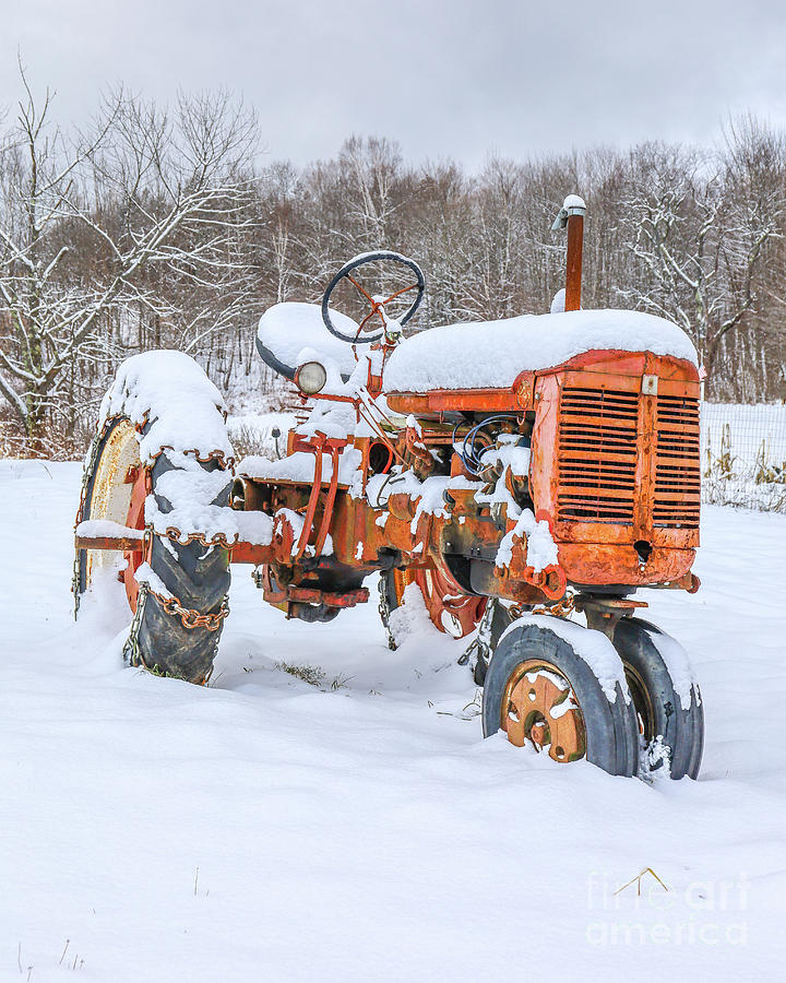 Trusty Old Farmall Vintage Tractor in the Snow Photograph by Edward Fielding