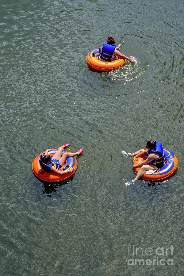 Tubing down the Potomac River at Harpers Ferry Photograph by William Kuta