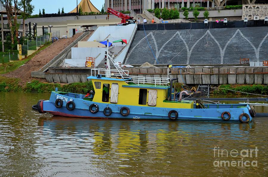 Crane Photograph - Tugboat works on musical fountain outside parliament building on Sarawak River Kuching Malaysia by Imran Ahmed