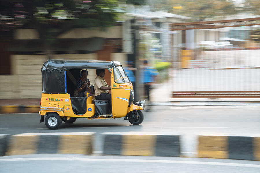 Tuktuk is a local transportation vehicle, on the road in Hyderabad. Photograph by Burakkarademir