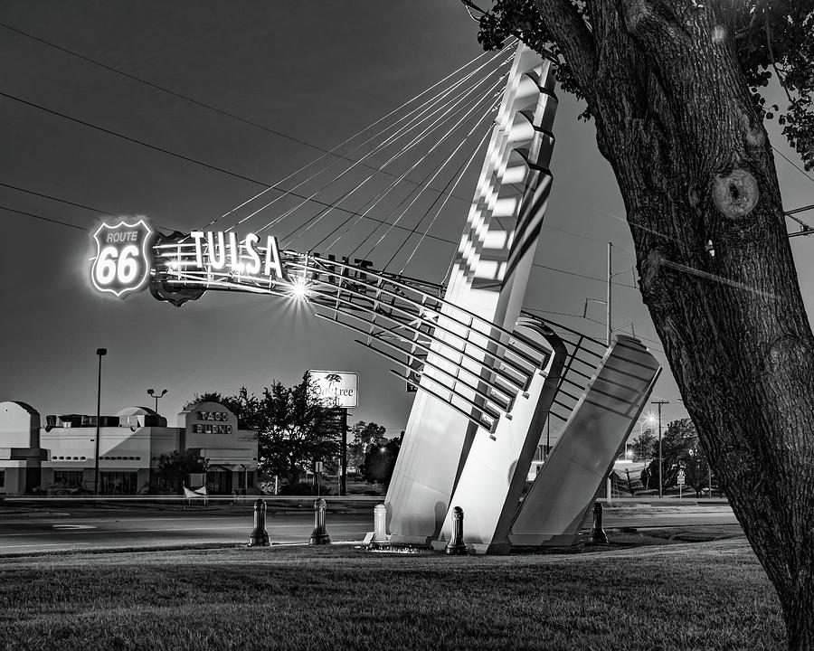 Black And White Photograph - Tulsa Western Gateway Arch and Neon Lights Along Route 66 - Black and White by Gregory Ballos