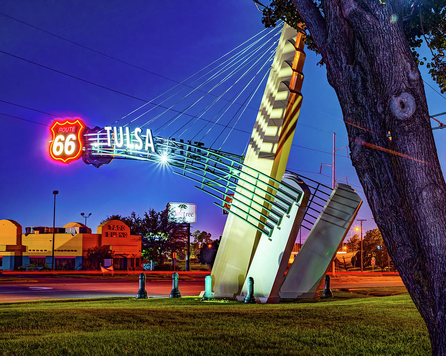 Tulsa Western Gateway Arch and Neon Lights Along Route 66 Photograph by Gregory Ballos
