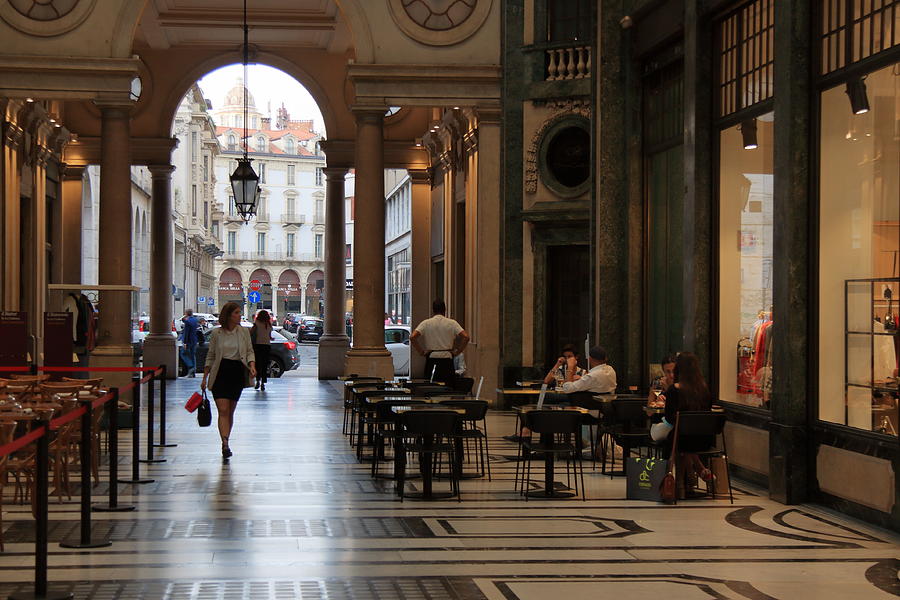 Turin, Italy - A Caucasian Woman Goes Shopping Under The Arcades Of The San Federico Photograph