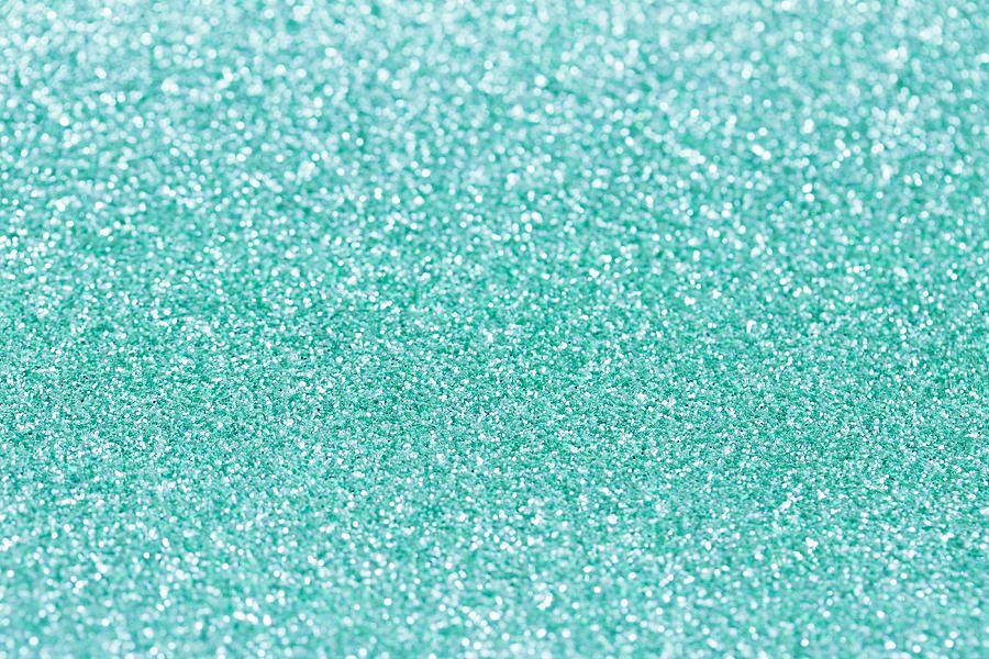 Turquoise background with sparkles. Photograph by Fotolotos