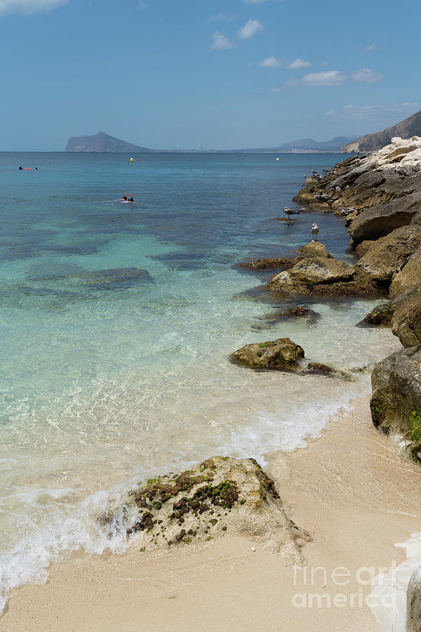 Turquoise blue sea water and rocks in Calpe 3 Photograph by Adriana Mueller