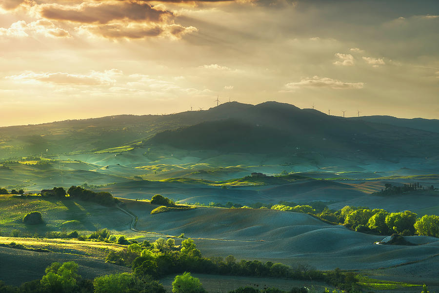 Tuscany, rolling hills on sunset. Rural landscape. Green fields  Photograph by Stefano Orazzini