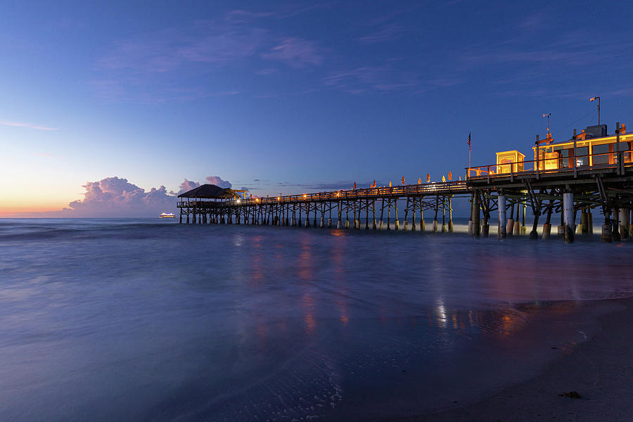 Twilight Hour at Westgate Cocoa Beach Pier Photograph by Claudia Domenig