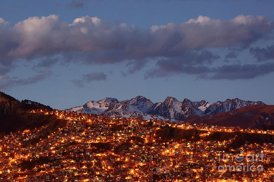 City Photograph - Twilight over the Andes Mountains and La Paz suburbs Bolivia by James Brunker