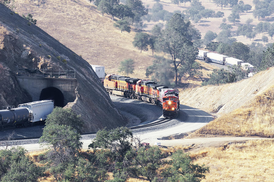 Twists and Turns -- BNSF Intermodal Train in the Tehachapi Mountains, California Photograph by Darin Volpe
