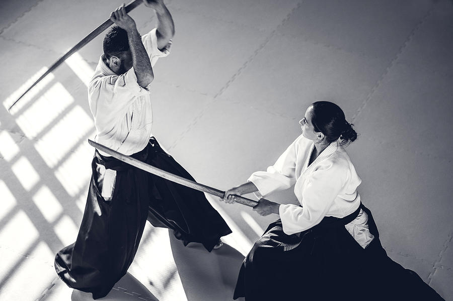 Two Aikido Fighters With Bokken Swords Photograph by Sanjeri