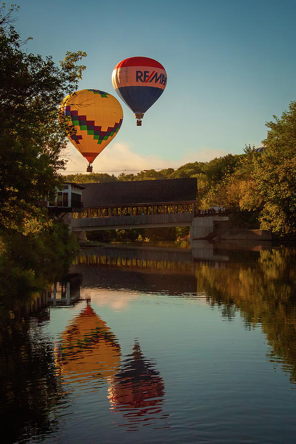 Two Balloons over the Quechee Covered Bridge Photograph by Jeff Folger