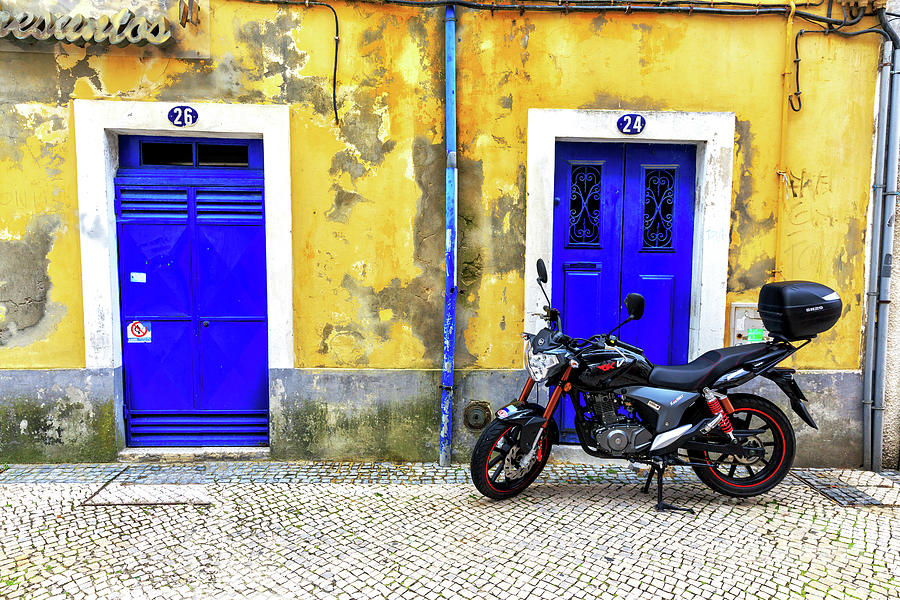 Two Blue Doors in Aveiro Photograph by John Rizzuto