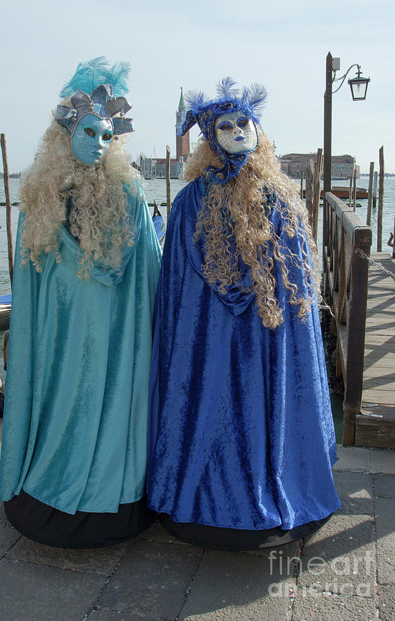 Two blue ladies in masks on Venice carnival Photograph by Irina Afonskaya