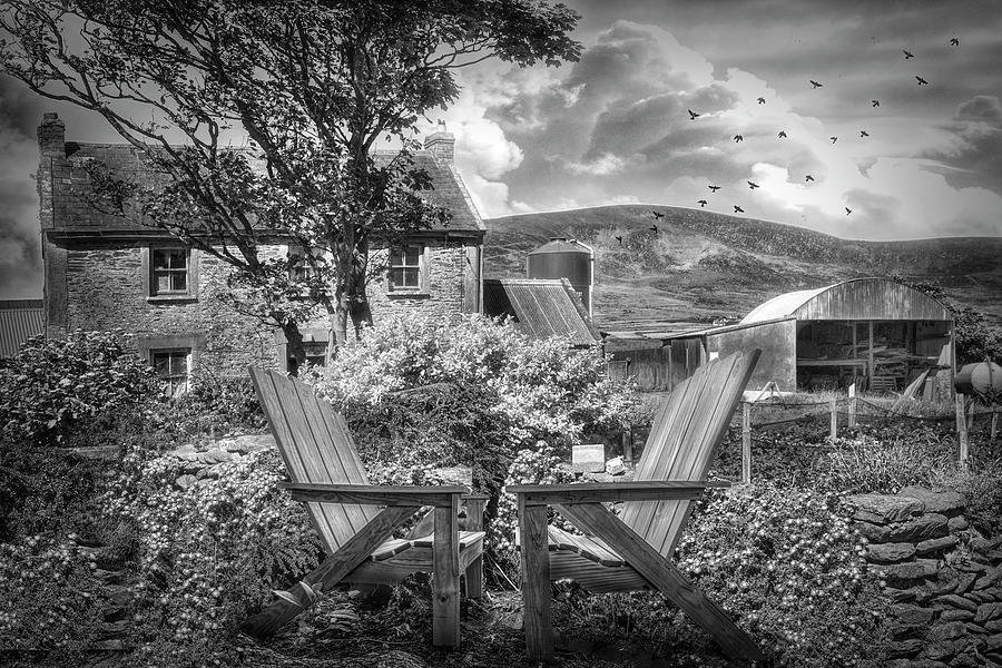 Two Chairs in an Irish Garden in Black and White Photograph by Debra and Dave Vanderlaan