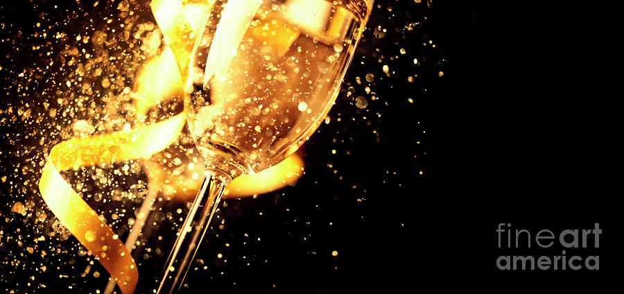 Two champagne glasses with golden ribbon and gold glitter splash Photograph by Jelena Jovanovic