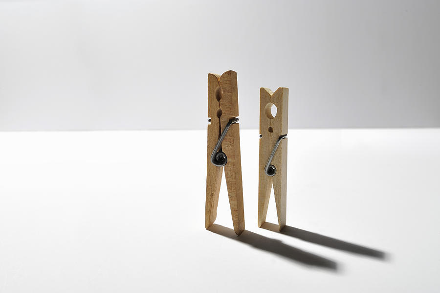 Two clothespins standing Photograph by Yagi Studio