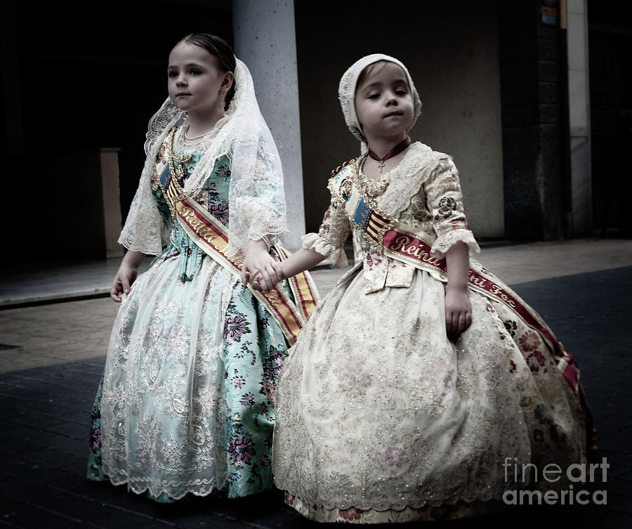Two cute young girls in traditional Spanish Costume taking part  Photograph by Peter Noyce