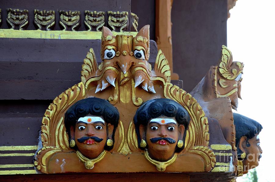 Animal Photograph - Two face head holy deity wood carving at Nallur Kandaswamy Hindu temple Jaffna Sri Lanka by Imran Ahmed