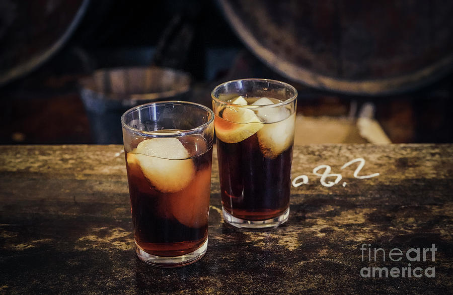 Two glasses of Vermouth Photograph by Perry Van Munster