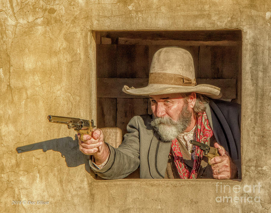 cowboy shooting two guns